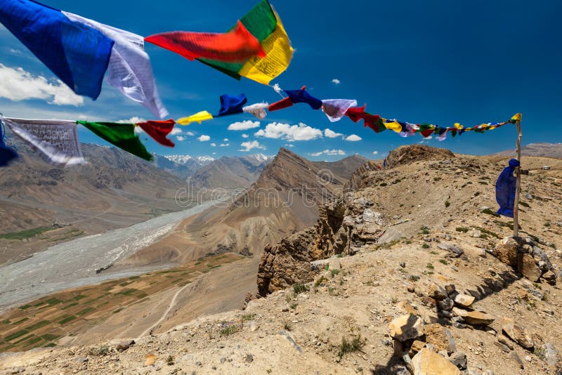 Buddhist prayer flags lungta with `Om mani padme hum...` mantra written on it. Spiti Valley, India.