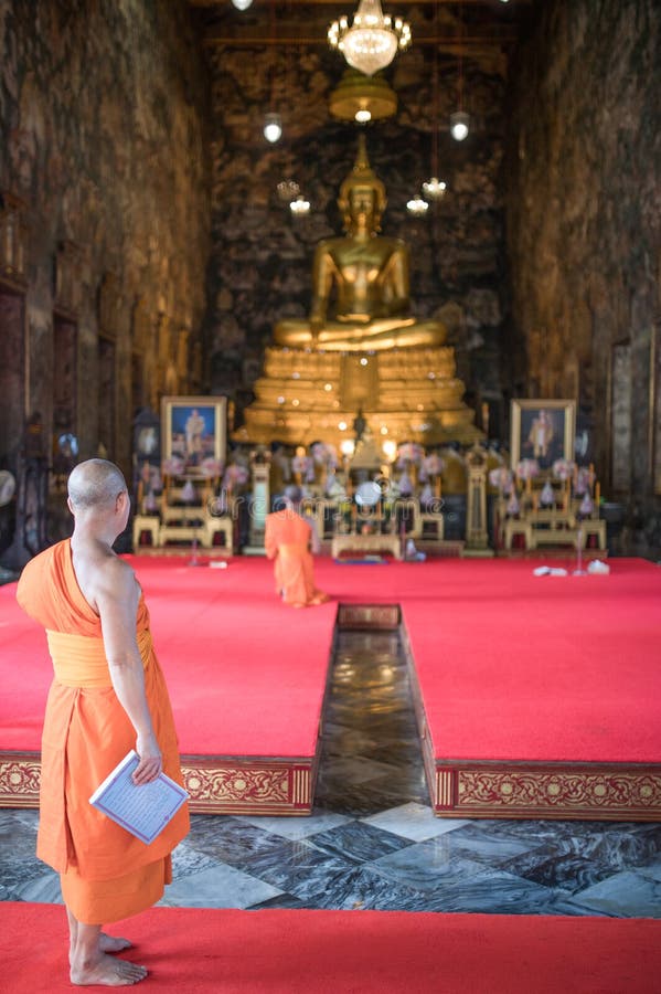 Buddhist royal temple Wat Suthat. Interiors, ornaments and the Budda sculpters or effigy. Thailand, Bangkok