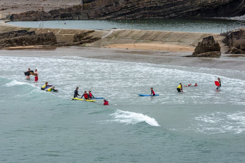 BUDE, CORNWALL/UK AUGUST 15 People Learning To Surf at Bude