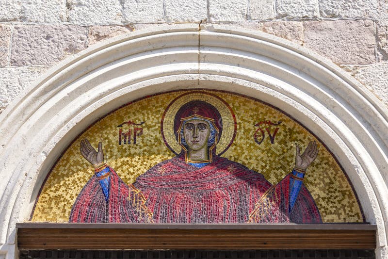 Religious themed mosaic above the entrance to the Holy Trinity Orthodox Church, Budva, Montenegro