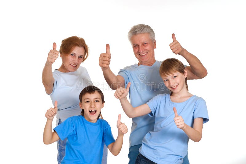 Buenos abuelos felices con los nietos engañados fotos de archivo libres de regalías Buenos abuelos felices con los nietos engañados fotos de archivo libres de regalías