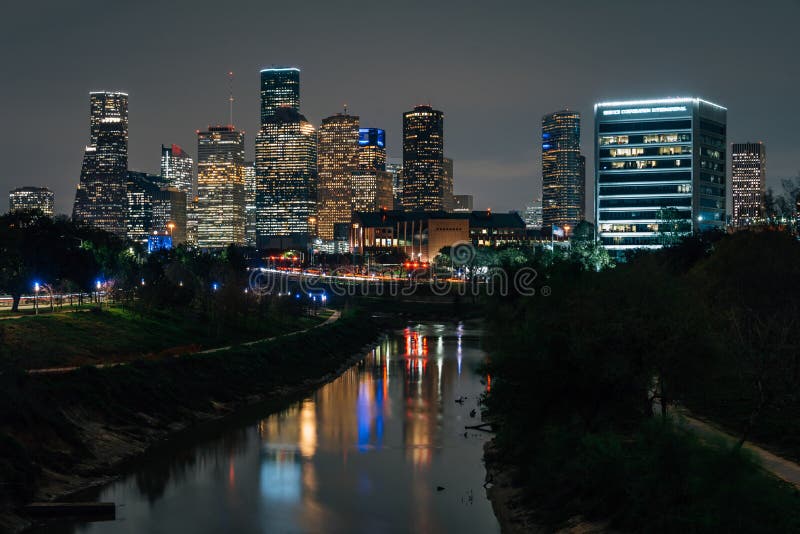 The Buffalo Bayou and Houston skyline at night, in Houston, Texas royalty free stock image