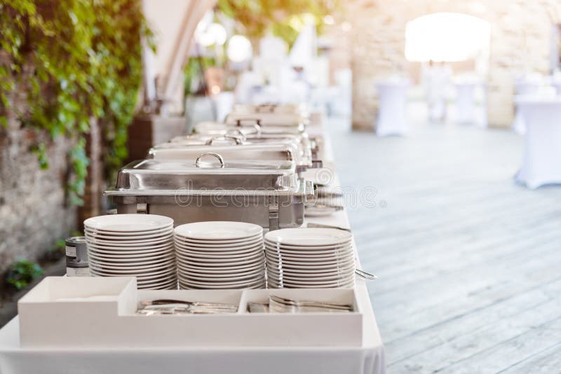 Buffet Heated Trays Standing in Line Ready for Service. Outdoors Buffet