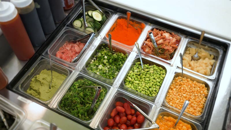 Buffet table full with varieties of fresh food stock photography