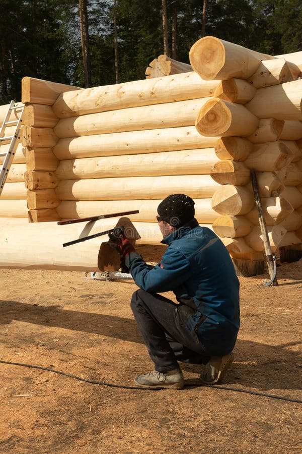 Build a House from Logs. Preparation of Logs for the Assembly of the