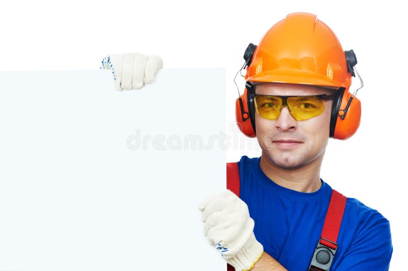 Builder in hard hat, earmuffs and goggles