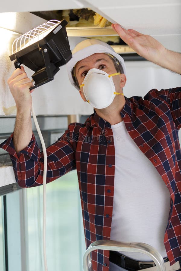 Builder lighting roof stock image. Image of roof, panel 204735901