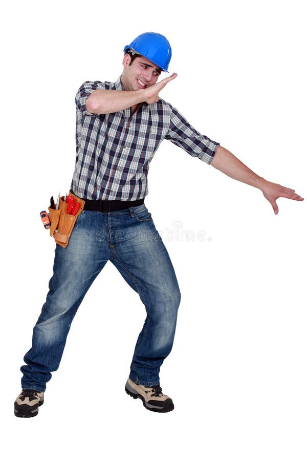 Builder shielding himself royalty free stock photo Builder shielding himself royalty free stock photo