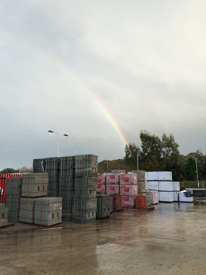 Builders yard rainbow editorial image. Image of rain 51542235