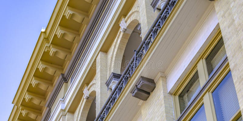 Building with brick wall and balcony