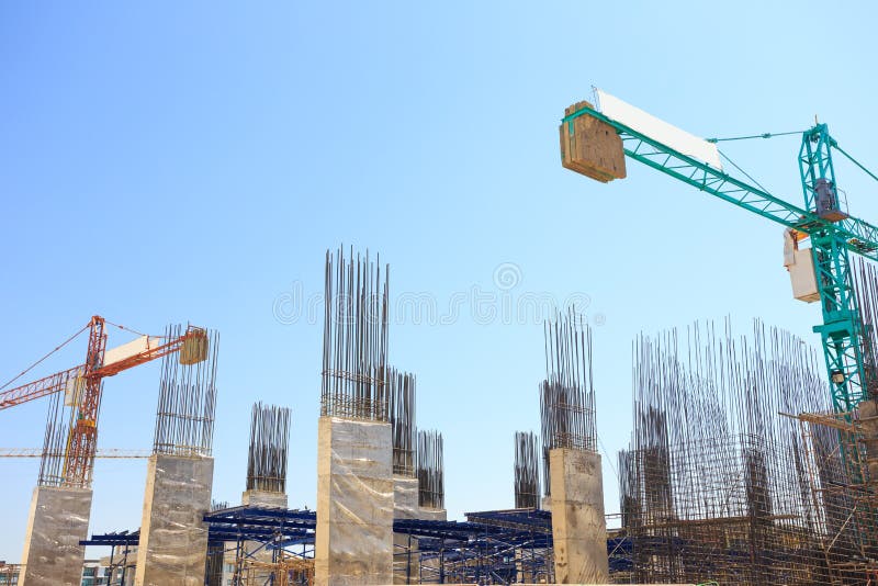 Building Cement Pillar in Construction Site with Blue Sky Stock Photo