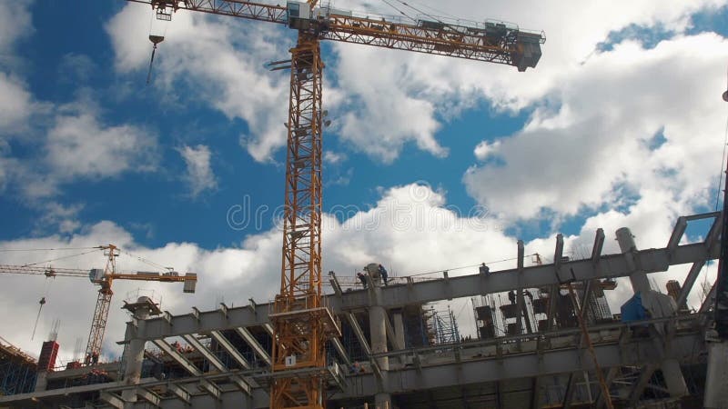 Building construction. Builders are building an apartment house. Residential quarter in the process of construction