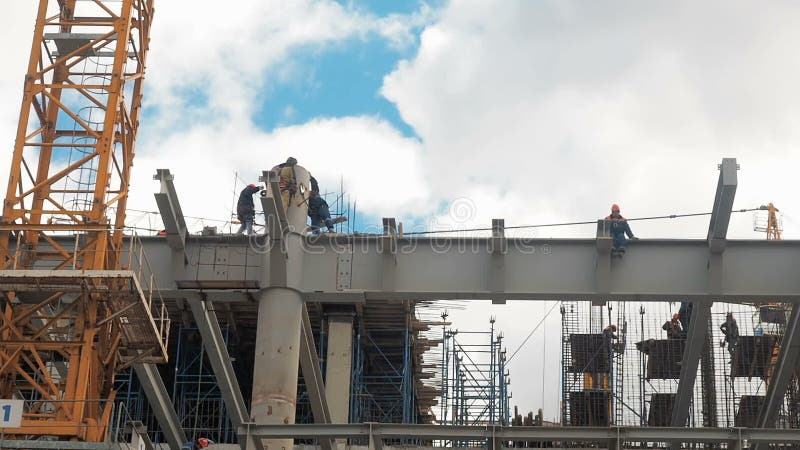 Building construction. Builders are building an apartment house. Residential quarter in the process of construction