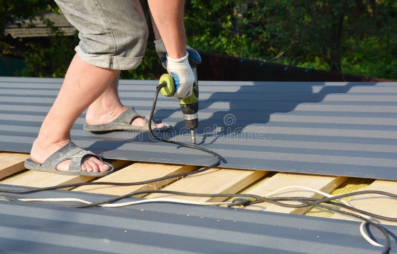 A Building Contractor is Installing Box Profile Sheeting, Paint Coated