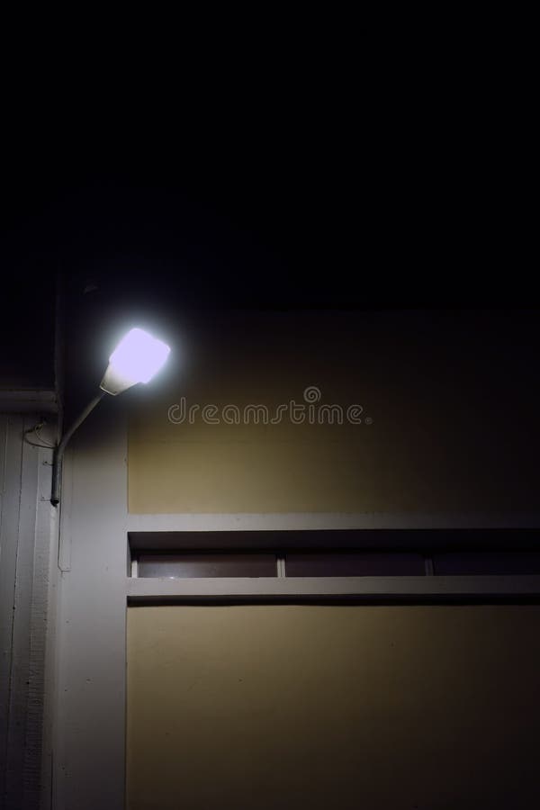 Building Exterior Illuminated by Flood Light at Night Stock Photo