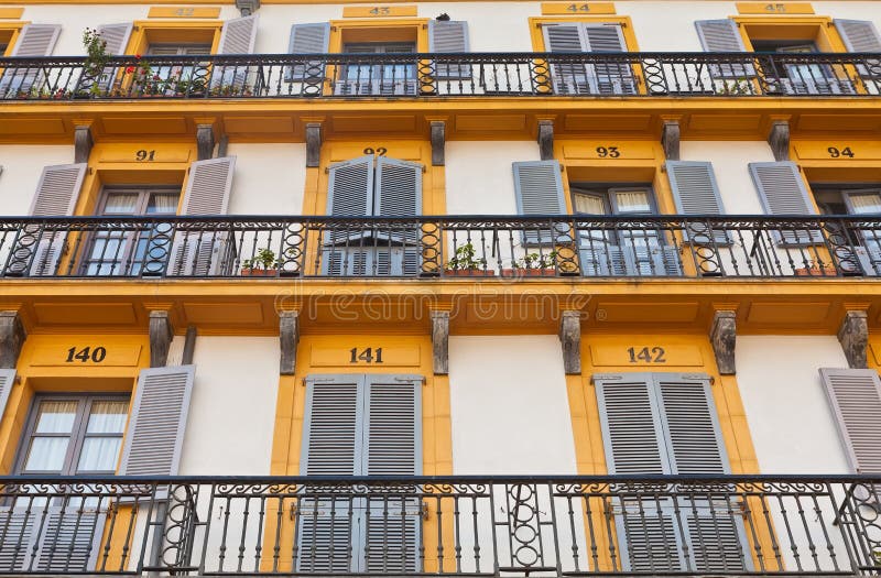 Building exterior with windows and balconies