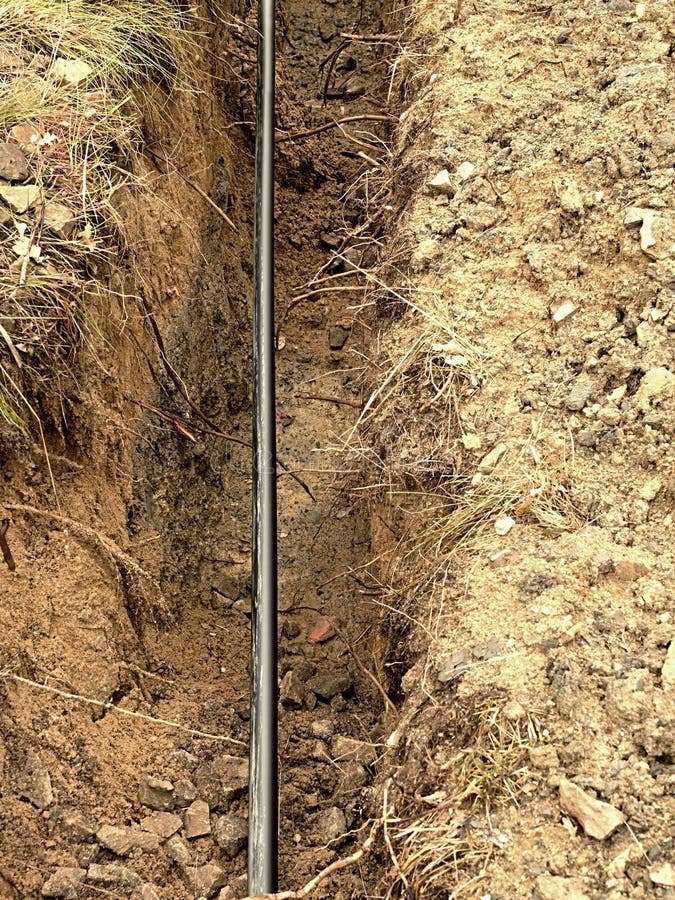 Building of Lines of Metallic and Fiber Optic Cables. Laying