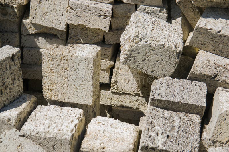 Building material for the construction of fences, houses. decorative facing building materials of cubic form
