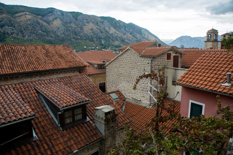Building with orange clay tiles and the Windows open stock photo Building with orange clay tiles and the Windows open stock photo