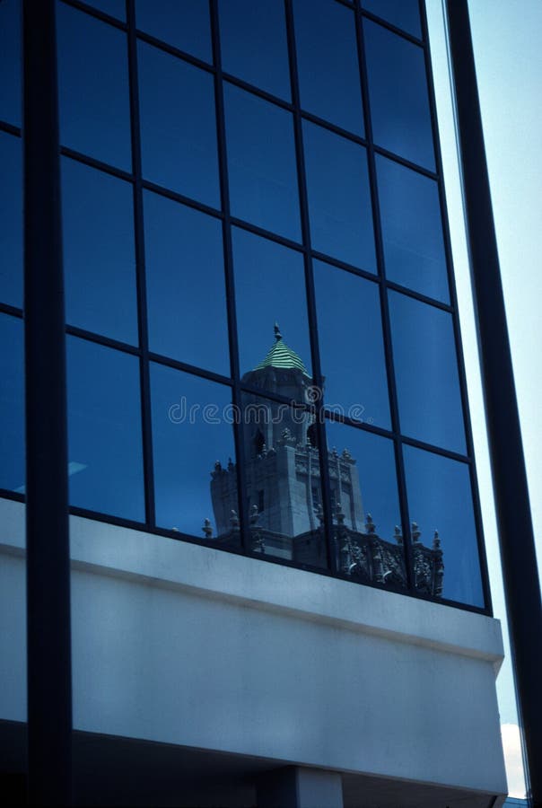 Building reflected in another building