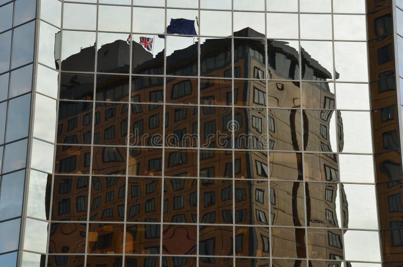 Building reflection distorted by glass windows stock photo Building reflection distorted by glass windows stock photo