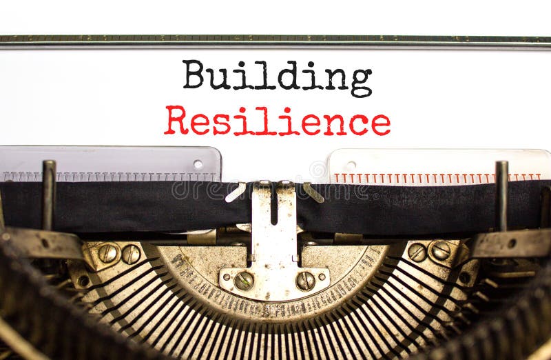 Building resilience symbol. Concept word Building resilience typed on retro old typewriter. Beautiful white background. Business