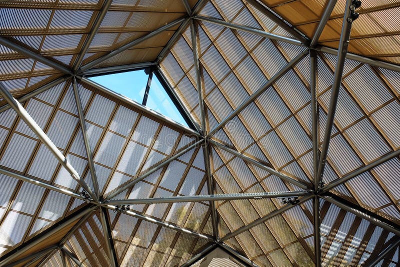 Building roof structure That is seen as interesting stripes Combined with the shadow of the overlapping building frame