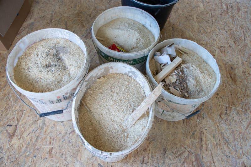 On Building Site the Wood Chips are Collected in Buckets Stock Image