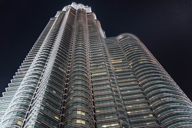 Building Skin On Ground Floor Of Twin Towers At Night In Kuala