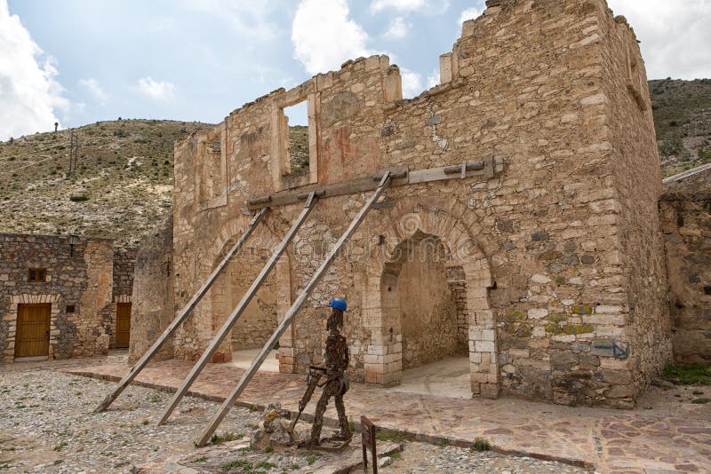 Building is stabilized from collapsing. May 22, 2014 Real de Catorce, Mexico: a building is stabilized from collapsing in the mostly abandoned silver mining town royalty free stock photo