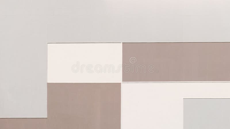 Building wall in pastel colors, geometric abstract background, rectangular shape pattern, painted texture with straight angles. Wide photo for web site slider.