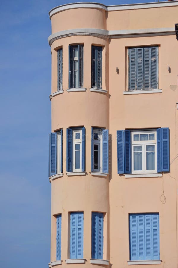 Building with white windows and blue dormers. Building with white windows and blue skylights. Shot in the open royalty free stock photo Building with white windows and blue dormers. Building with white windows and blue skylights. Shot in the open royalty free stock photo
