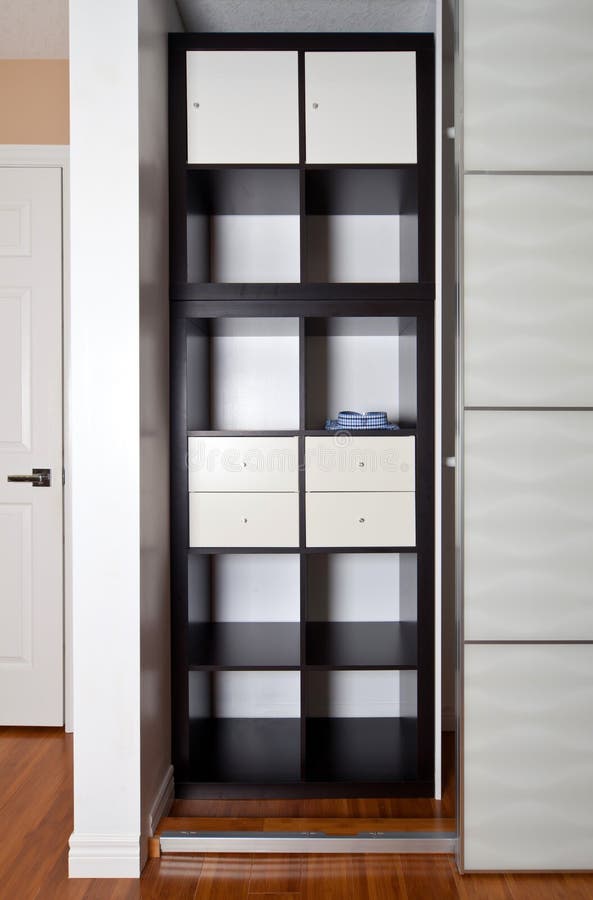 Builtin Closet with Sliding Door Shelving Storage Organization Stock