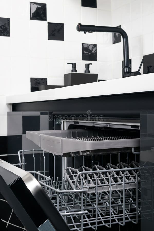 Builtin Dishwasher in Black and White Kitchen Design, Closeup Stock