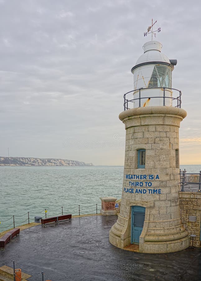 Folkestone Lighthouse from harbour wall. Kent, UK