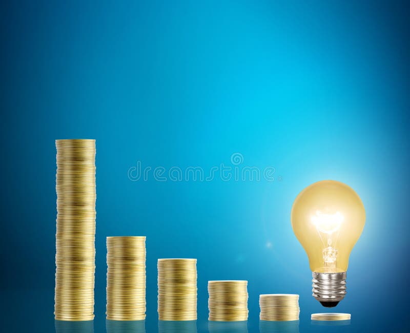 Bulb With Stack Of Coins stock photography