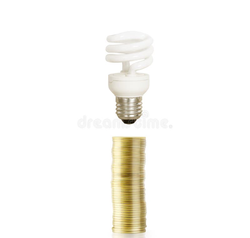 Bulb With Stack Of Coins royalty free stock images