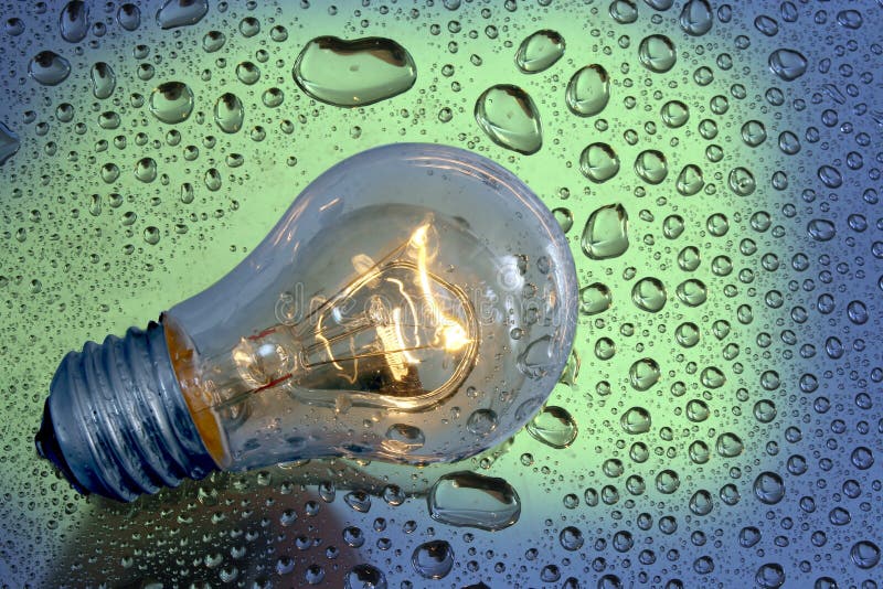Bulb and water drops stock image. Image of lamp, reflection 2990745