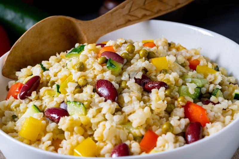Bulgur Kaszotto with Fresh Vegetables and Kidney Bean Stock Photo