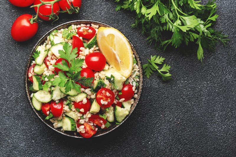 Bulgur Tabbouleh Salad with Fresh Tomatoes, Cucumbers, Parsley and