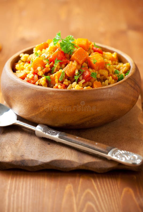 Bulgur with tomatoes and butternut squash. Bulgur with tomatoes and butternut squash