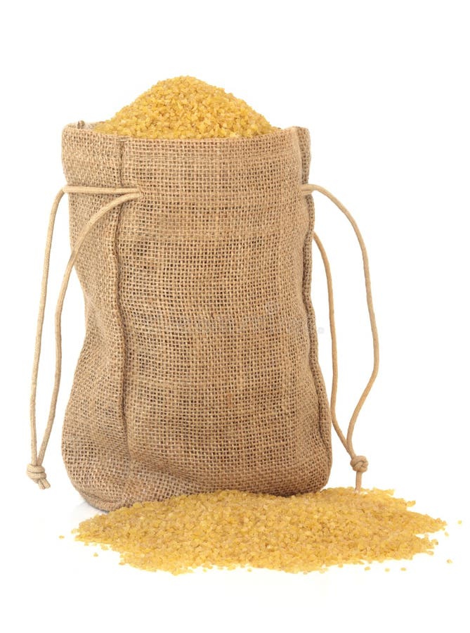 Bulghur wheat in a hessian sack over white background. Bulghur wheat in a hessian sack over white background.