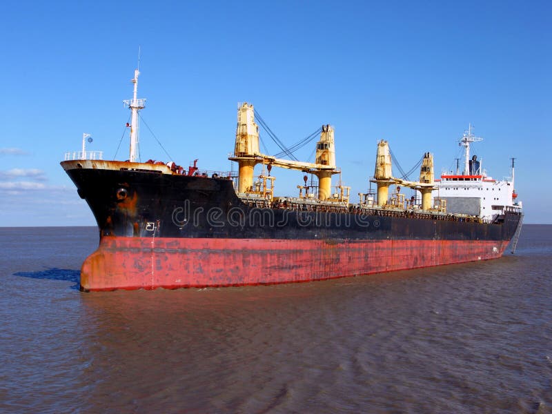 Bulk Carrier Cargo Ship Boat Sailing on Calm Water stock images Bulk Carrier Cargo Ship Boat Sailing on Calm Water stock images
