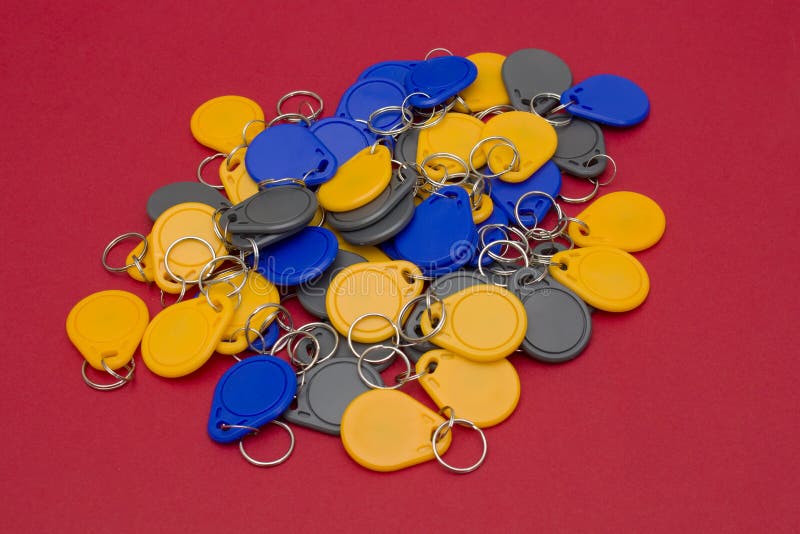 Bulk of NFC Key chains stock image. Image of isolated 130382759