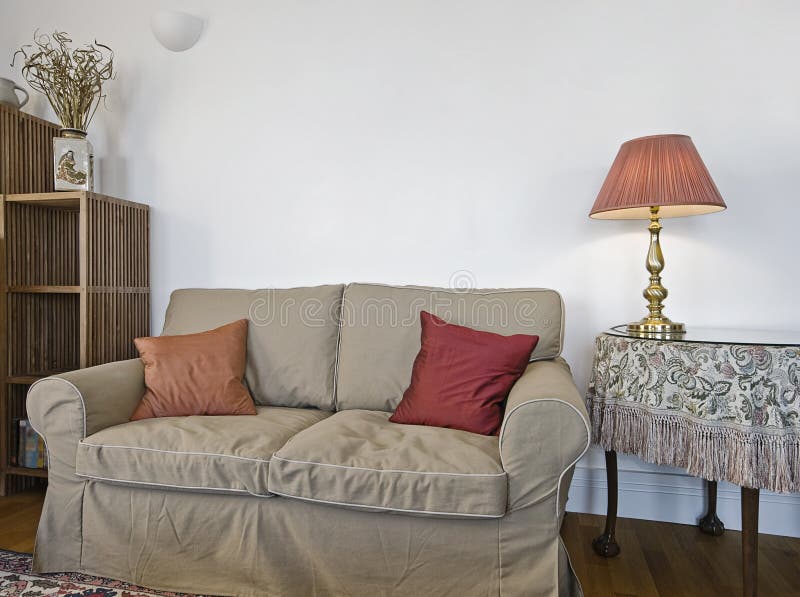 Bulky sofa detail stock photo. Image of floor, book, gold 12028326