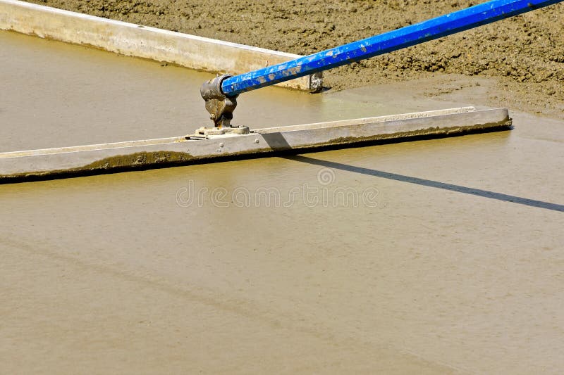 Bull float being used on a concrete project royalty free stock photo