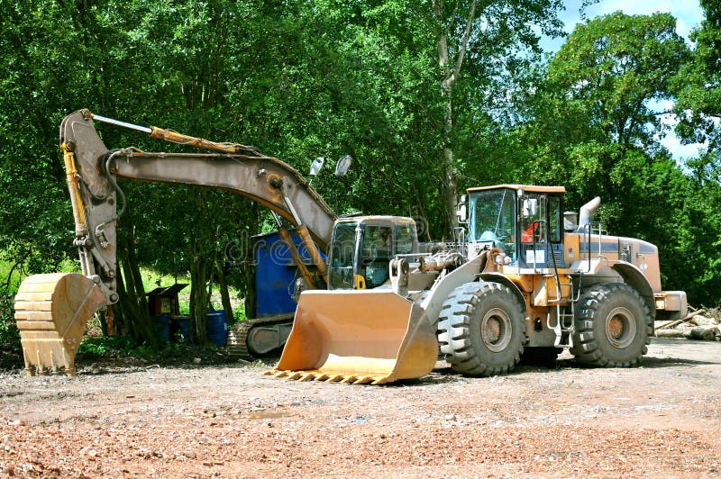 Excavator And Bulldozer Build Stock Photo Image of development, white