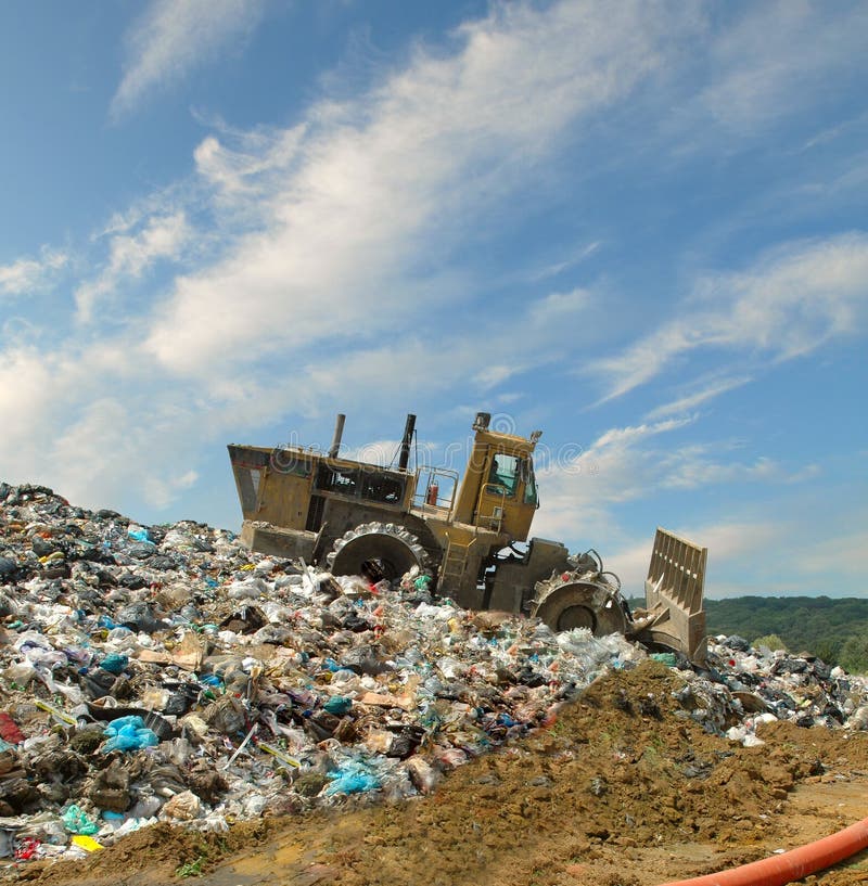 The bulldozer on a garbage dump