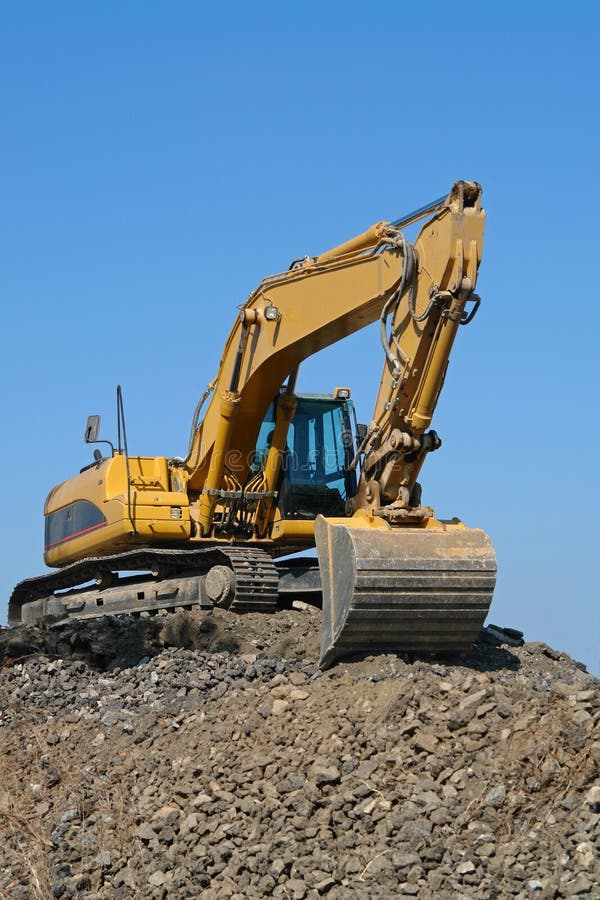 Bulldozer sul lavoro fotografie stock Bulldozer sul lavoro fotografie stock