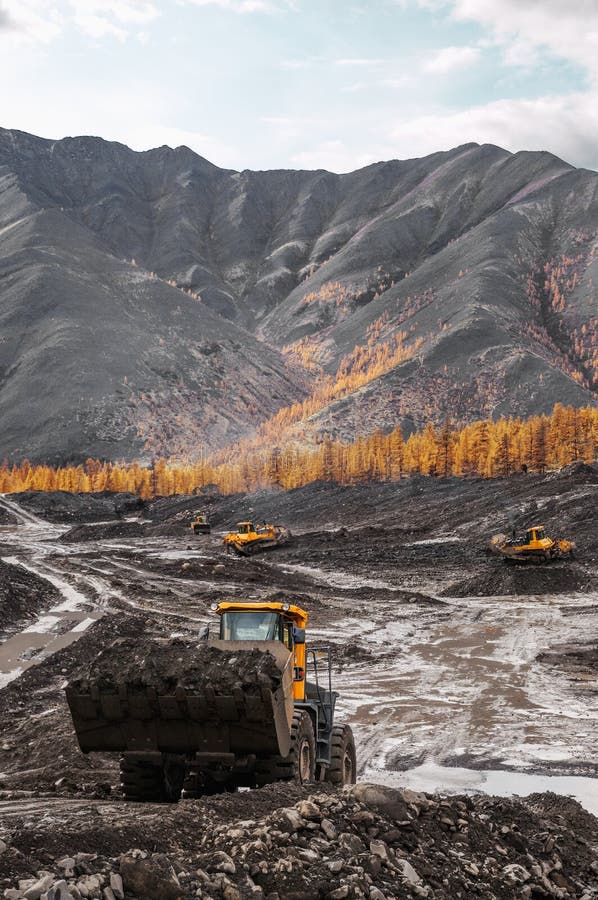 Open pit mining of natural gold in the mountains of Eastern Siberia.
In the process of work, such equipment is used as: Bulldozers, wheel loaders, mining dump trucks, Excavators, Stationary industrial equipment for washing natural gold. Open pit mining of natural gold in the mountains of Eastern Siberia.
In the process of work, such equipment is used as: Bulldozers, wheel loaders, mining dump trucks, Excavators, Stationary industrial equipment for washing natural gold